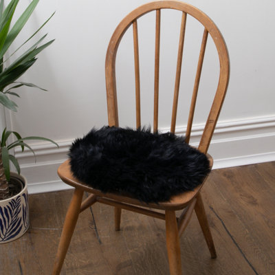 Native Natural Sheepskin Chair Pad Round Black from B&Q