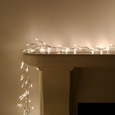 960 LED 12m Premier Cluster Indoor Outdoor Multi Function Mains Operated Christmas Lights with Timer on Clear Cable in Warm White