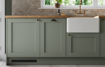 The Alpinia green kitchen, featuring matt green shaker cabinets.