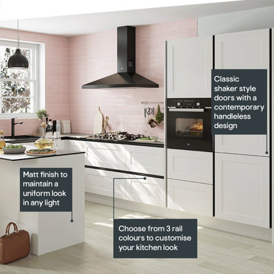 Kitchen featuring classic shaker style doors in white, with a contemporary handleless design in a matt finish for a uniform look in any light. Choose from three rail colours to customise your kitchen look.