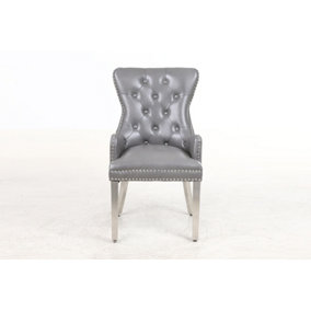 A Pair Grey Leather Aire Tuffted Metal Knocker& Studs Back Dining Chairs with Solid Chrome Legs