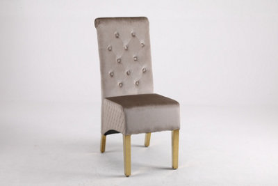 A Pair of Velvet Dining Chairs with Golden Legs in Brown