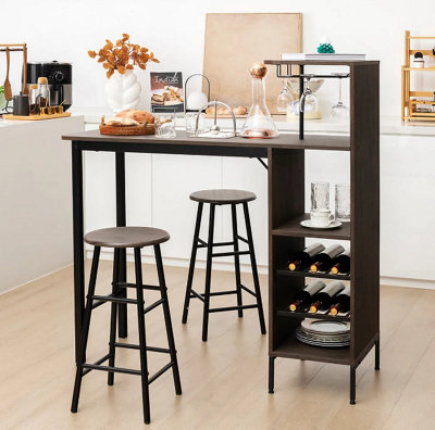 White kitchen with a black compact bar dining set.