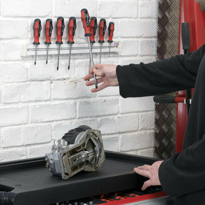Wall mounted magnetic tool holder.