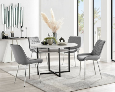 Grey round dining table and online chairs