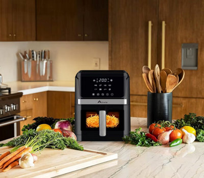 Innsky - An air fryer is a kitchen appliance that cooks by