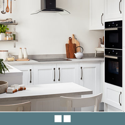 Explore the Alpinia matt white kitchen. Alpinia is a tongue and groove shaker style, available in 8 colours and is part of the Select Collection.