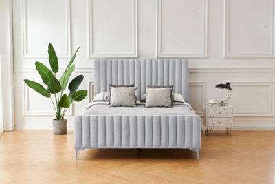 Upholstered bed store with footboard king