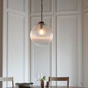 Anson Lighting Boston Pendant light finished in Antique brass plate and clear ribbed glass