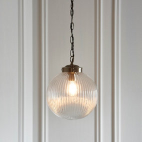 Anson Lighting Boston Pendant light finished in Antique brass plate and clear ribbed glass