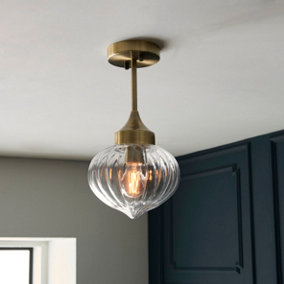 Anson Lighting Carrington Semi Flush light finished in Antique brass plate and clear ribbed glass