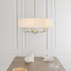 Anson Lighting Eureka 6lt Pendant light finished in Brass plate and vintage white fabric