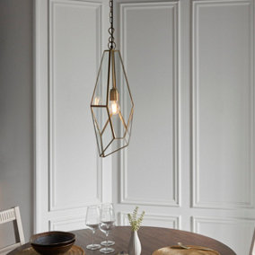 Anson Lighting Forka Pendant light finished in Antique brass plate and clear glass