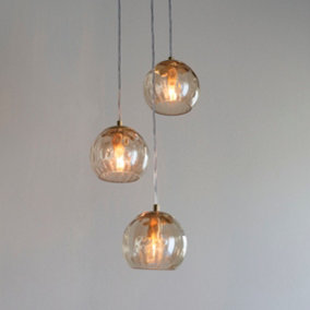 Anson Lighting Iowa 3lt Pendant light finished in Satin brass plate and champagne lustre glass