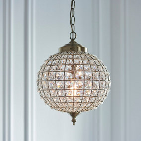 Anson Lighting Lily Pendant light finished in Antique brass plate and clear glass