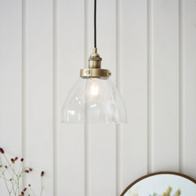 Anson Lighting Pampa Pendant light finished in Antique brass plate and clear glass