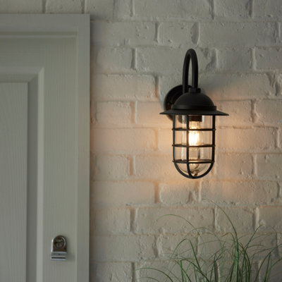 Anson Lighting Rikko outdoor wall light finished in Textured black and clear glass