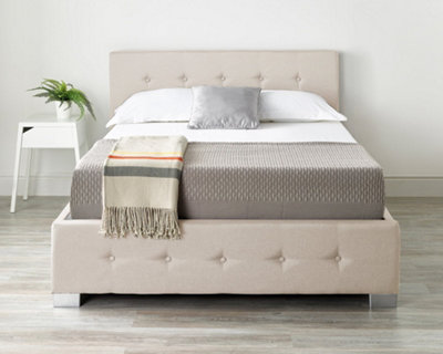 Beige upholstered deals bed with storage