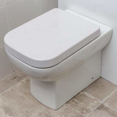 Astral Back to Wall Toilet with Soft Close Toilet Seat & Anti-Bacterial Glaze