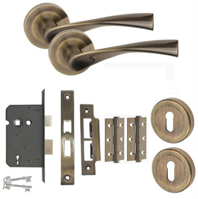 Astrid Key Lock Door Handle Set HInges and Mortise Lock Antique Brass