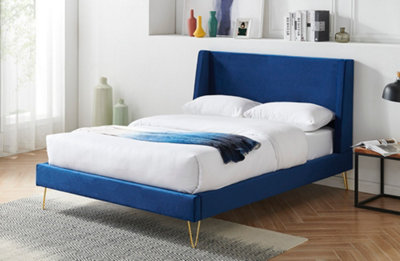 Upholstered bed deals with gold legs