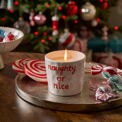Shop Christmas candles.