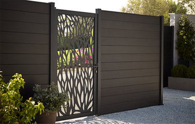 The neva modular fencing, featuring a contemporary leaf-pattern design, powder-coated dark grey finish, and Euro cylinder lock, designed to complement Neva modular fencing systems. 