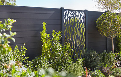The neva leaf gate with supporting Neva fence slats, featuring a contemporary leaf-pattern design, powder-coated dark grey finish, and Euro cylinder lock, designed to complement Neva modular fencing systems