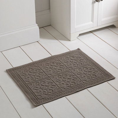 Shop bath and shower mats.