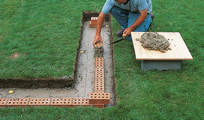 How to repair & build a brick garden wall at B&Q