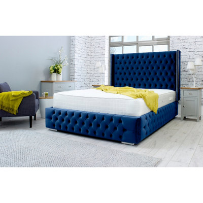 Benito Plush Bed Frame With Winged Headboard - Blue | DIY at B&Q