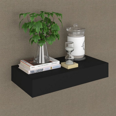 Black floating store shelf with drawer