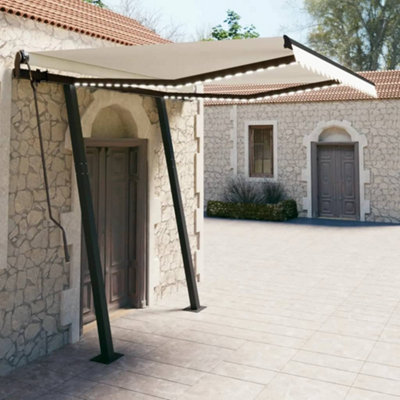 Berkfield Manual Retractable Awning with LED 3x2.5 m Cream