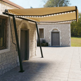 Berkfield Manual Retractable Awning with LED 4.5x3 m Yellow and White