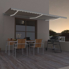 Berkfield Manual Retractable Awning with LED 600x300 cm Cream