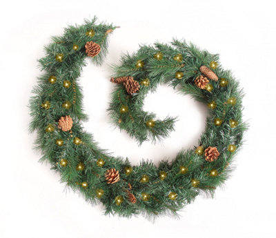 Best Artificial 6ft Colorado Pine Christmas Garland with Pine Cones with 50 warm white battery lights