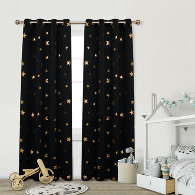 Black children's curtains with gold stars.