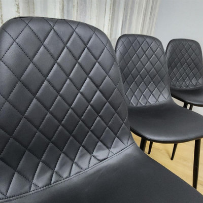 Black Glass Dining Table Set With 4 Black Faux Leather Gem Pattern ...