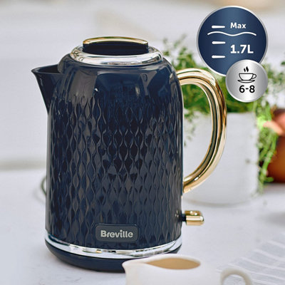 https://media.diy.com/is/image/KingfisherDigital/breville-vkt171-curve-navy-gold-jug-kettle-1-7-litres~5060569671375_03c_MP?$MOB_PREV$&$width=618&$height=618