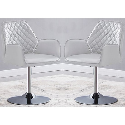 Bucketeer Swivel White Faux Leather Dining Chairs In Pair