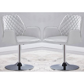 Bucketeer Swivel White Faux Leather Dining Chairs In Pair