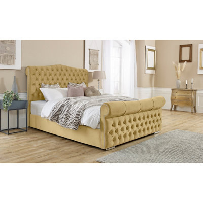 Beige upholstered deals sleigh bed