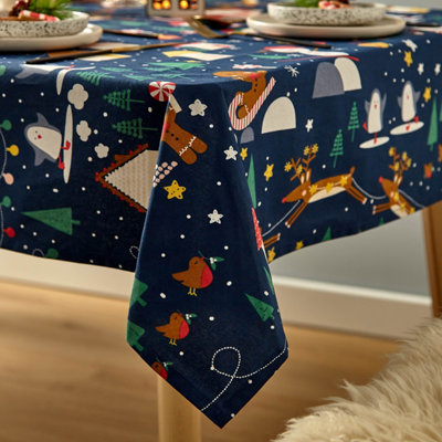 Catherine Lansfield Dining Santa's Christmas Wonderland Wipe Clean 137x229 cm Table Cloth Navy