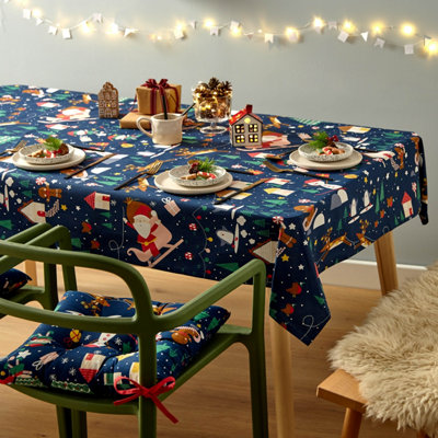 Catherine Lansfield Dining Santa's Christmas Wonderland Wipe Clean 137x229 cm Table Cloth Navy