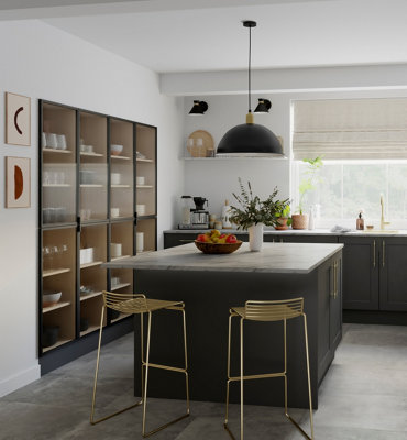 Modern dark grey Scandi style kitchen with large kitchen island, gold effect bar stools and a large black domed pendant light.