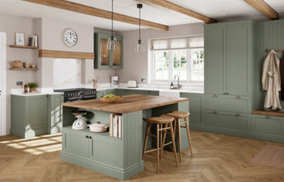 The Tydeman kitchen, featuring shaker style cabinets in muted, earthy green.