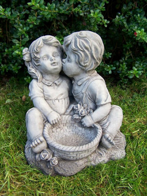 Charming Kissing Children with Flowerpot