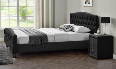 Tufted king deals bed with footboard