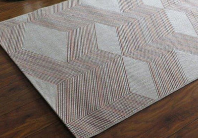 Chevron Patterned Rug-Jagged Red & Orange Zigzags on Cream background ...