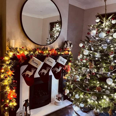 Christmas garland with lights for stairs top
